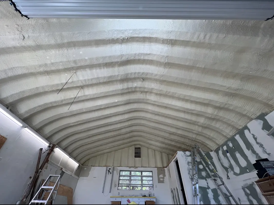 Spray polyurethane foam applied to the underside of a metal roof deck in Ocala
